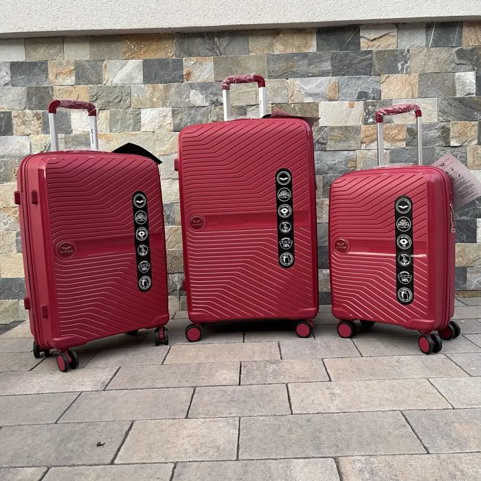 Валіза дорожня велика з поліпропілену Wings DQ181-04 L Червоний