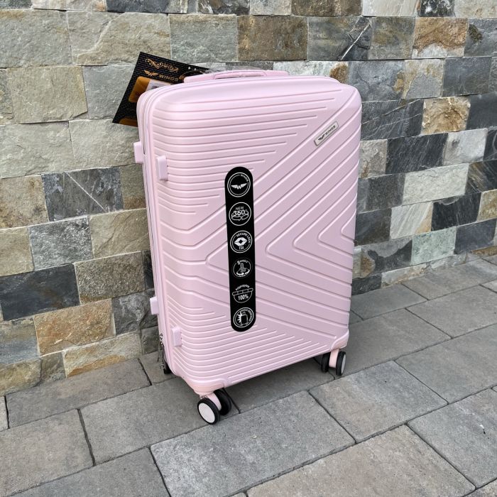Валіза дорожня середня з поліпропілену Wings DQ181-05 M Рожевий