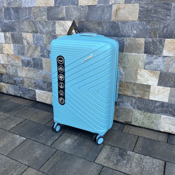 Валіза дорожня середня з поліпропілену Wings DQ181-05 M Блакитний (Macaron blue)